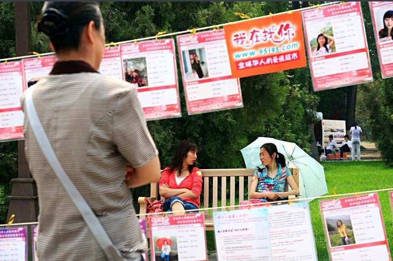 A mother reads information of unmarried youngsters.