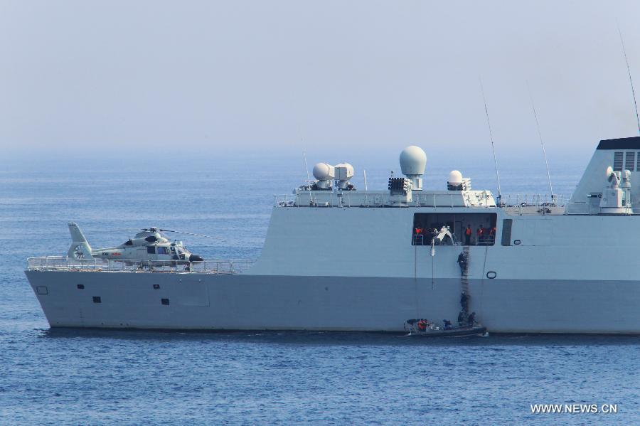 Chinese naval vessel attends the exercise of rescue of hijacked vessel during the "Joint Sea-2013" drill at Peter the Great Bay in Russia, July 9, 2013. Chinese and Russian warships carried out a variety of exercises including joint air defense, maritime supply, joint escort and the rescue of hijacked vessels during the second day of "Joint Sea-2013" drill. (Xinhua/Zha Chunming) 