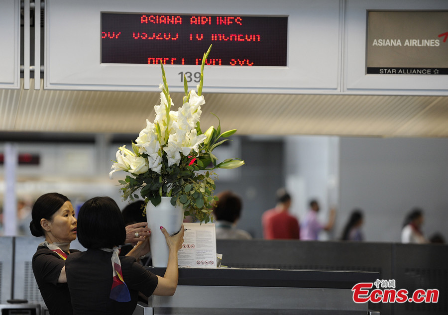 Asiana Airlines' flights to Beijing at San Francisco International Airport are back to normal on July 8, 2013, after the airport re-opens some international airlines. Due to a deadly crash on July 6, the airport was completely closed for all approaching and departing flights. Two Chinese schoolgirls were killed and 182 passengers injured in the crash. (Photo: crienglish/CNS)