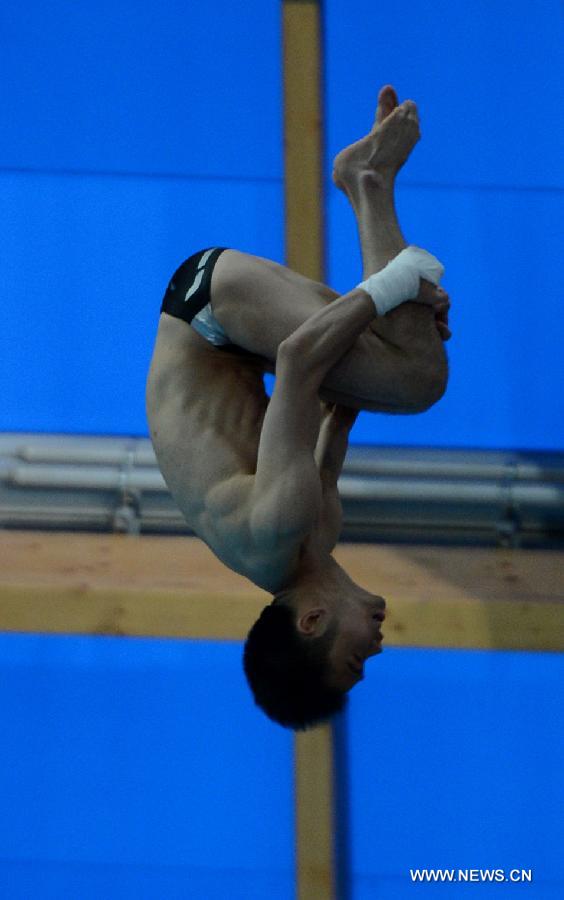 Wu Jun of China competes during the final of men's 10m platform diving at the 27th Summer Universiade in Kazan, Russia, July 10, 2013. Wu Jun won the silver medal with 520.40. (Xinhua/Kong Hui)