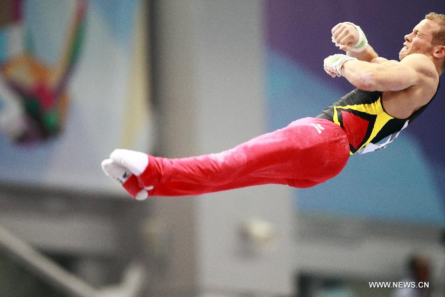 Fabian Hambuechen of Germany competes during the men's high bar final at the 27th Summer Universiade in Kazan, Russia, July 10, 2013. Hambuechen took the 8th place with 14.300 points. (Xinhua/Ren Yuan)