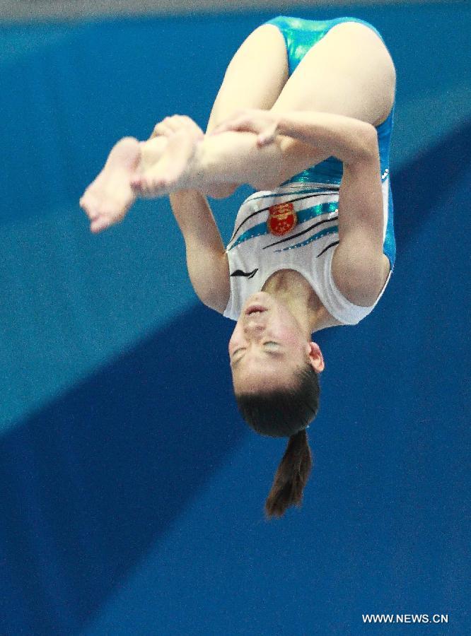 Zhang Yelinzi of China competes during the women's balance beam final at the 27th Summer Universiade in Kazan, Russia, July 10, 2013. Zhang Yelinzi won the gold medal with 15.150 points. (Xinhua/Ren Yuan)