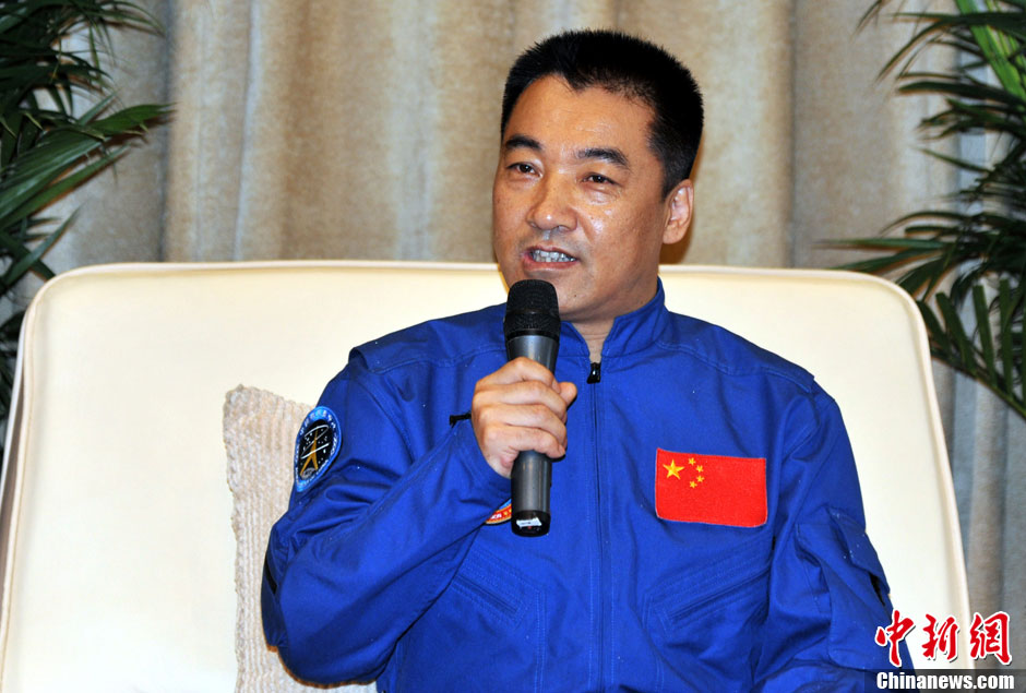 China’s astronaut Zhang Xiaoguang answers media’s questions at space city in Beijing on July 11. (Chinanews.com/ Sun Zifa)