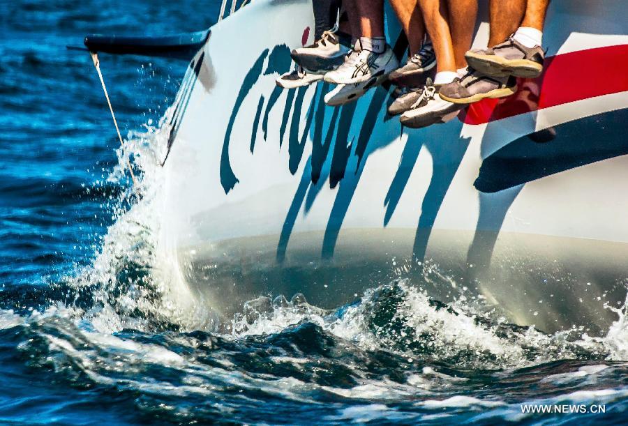 The crew of the vessel "Crioula" participates in the try-out of class S40 during the Ilhabela Sailing Week 2013, in Ilhabela, Brazil, on July 10, 2013. The regatta of Wednesday was a medium path around the Buzios Island, northeast of Ilhabela. (Xinhua/Marcos Mendez)