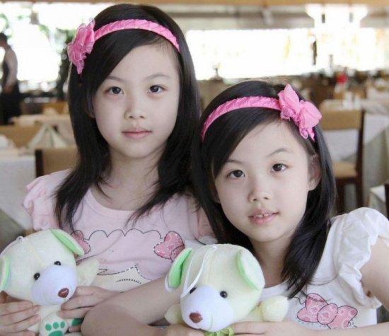 Li Yifei and Li Angrong, nicknamed Guoguo and Duoduo, were born in China’s Shandong Province on June 11, 2003. They have staged on TV shows with many Chinese superstars. (Photo/ zjol.com.cn) 