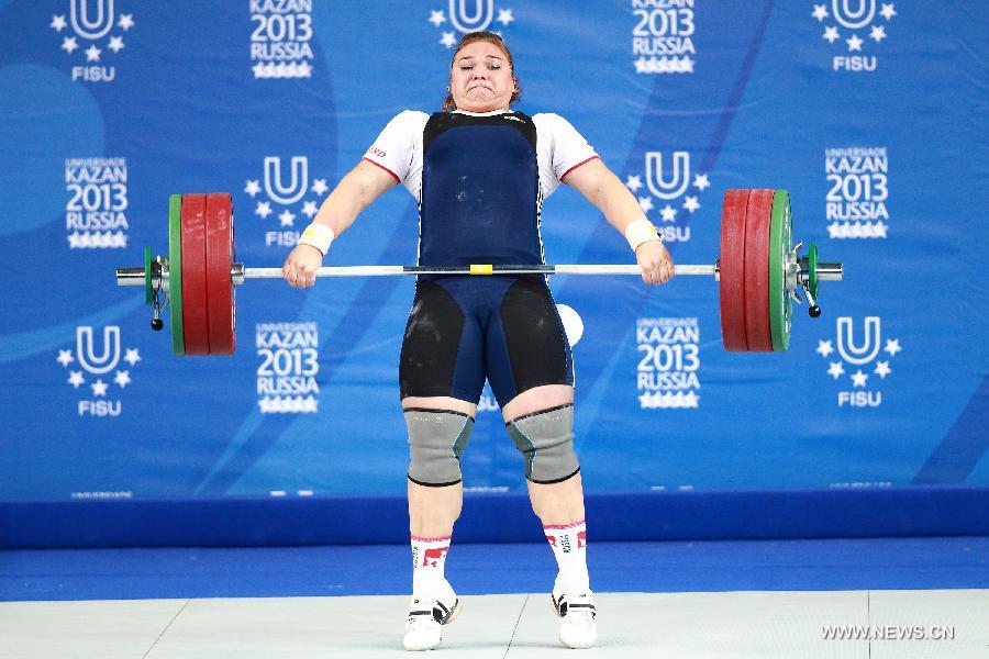 Tatiana Kashirina of Russia competes during the women's +75kg weightlifting competition at the 27th Summer Universiade in Kazan, Russia, July 11, 2013. Kashirina won the gold medal with a weight of 319kg. (Xinhua/Ren Yuan) 