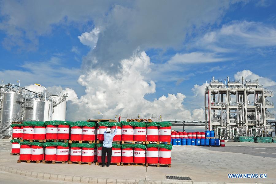 Photo taken on July 11, 2013 shows the Sinopec Lubricant (Singapore) Pte Ltd at Tuas in the south western tip of Singapore. China Petroleum and Chemical Corporation (Sinopec), China's largest integrated energy and chemical group, celebrated here on Thursday the opening of its first lubricant plant outside China. The Sinopec Lubricant (Singapore) Pte Ltd, located at Tuas in the south western tip of Singapore, covers an area of 242,811 square meters. (Xinhua/Then Chih Wey)