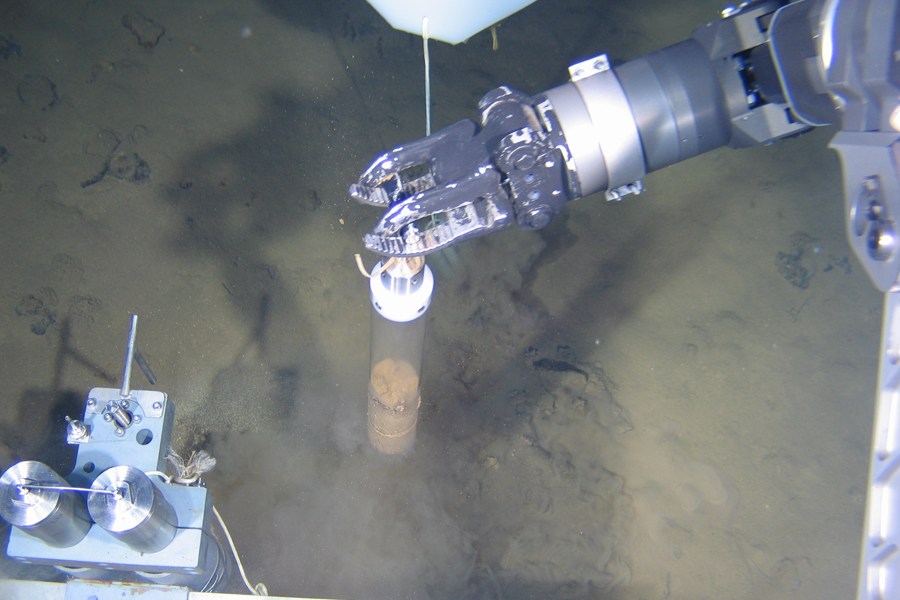 The Jiaolong has completed its third experimental dive and returns safely to its mother ship on June 22. It reached maximum depth of 6,963 meters, and collected three water samples, and three sediments samples. It also took photos of seafloor creatures. (Xinhua News Agency/Zhang Xudong)