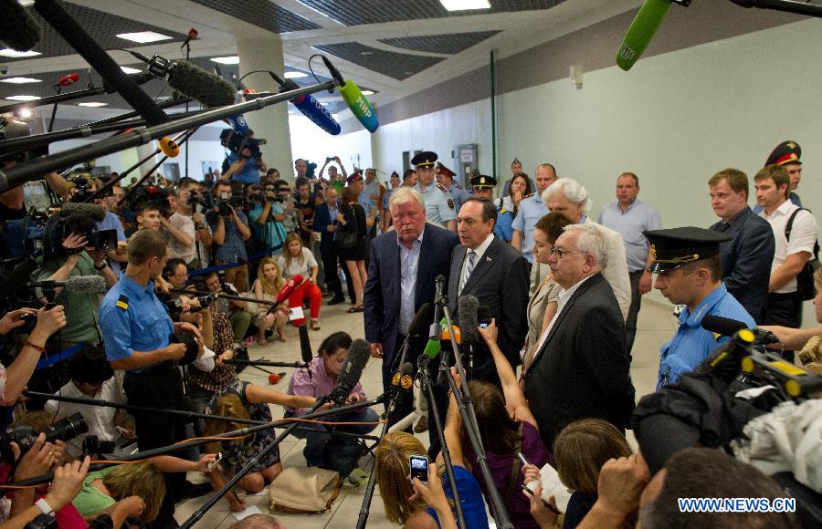 Representatives receive interviews after a meeting with former U.S. spy agency contractor Edward Snowden at Moscow's Sheremetyevo International Airport, Russia, on July 12, 2013. Edward Snowden plans to apply for political asylum in Russia, a Russian parliamentarian said Friday after meeting with the stranded whistleblower. (Xinhua/Jiang Kehong)