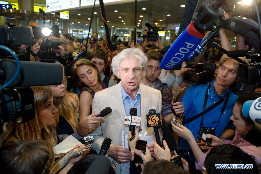 A representative of a Russian human rights organization receives interviews in Terminal F at Moscow's Sheremetyevo International Airport, Russia, on July 12, 2013. Former U.S. spy agency contractor Edward Snowden planned to meet with Russian activists, lawyers as well as representatives from other organizations on Friday, Moscow's Sheremetyevo airport authority confirmed. (Xinhua/Jiang Kehong)