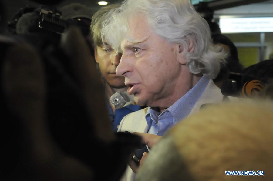 A representative of a Russian human rights organization receives interviews in Terminal F at Moscow's Sheremetyevo International Airport, Russia, on July 12, 2013. Former U.S. spy agency contractor Edward Snowden planned to meet with Russian activists, lawyers as well as representatives from other organizations on Friday, Moscow's Sheremetyevo airport authority confirmed. (Xinhua/Liu Hongxia)