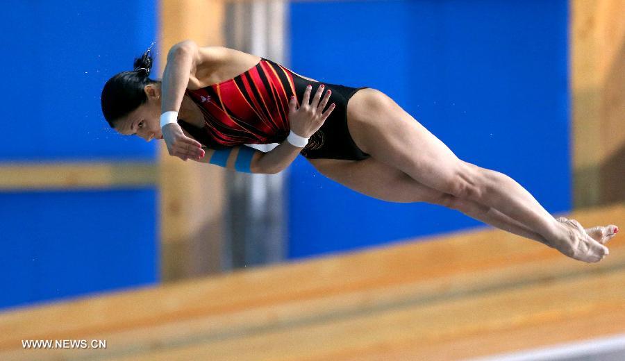 Yulia Koltunova of Russia competes during the women's 10m Platform final at the 27th Summer Universiade in Kazan, Russia, July 8, 2013. Koltunova claimed the title with a score 347.35. (Xinhua/Li Ying)