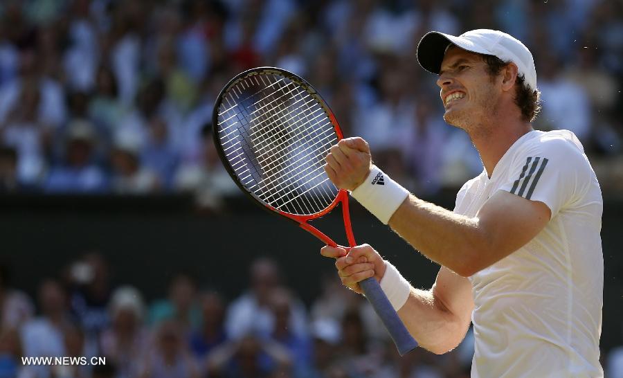 Andy Murray of Britain celebrates during the men's singles final with Novak Djokovic of Serbia on day 13 of the Wimbledon Lawn Tennis Championships at the All England Lawn Tennis and Croquet Club in London, Britain, July 7, 2013. Andy Murray on Sunday won his first Wimbledon title and ended Britain's 77-year wait for a men's champion with a 6-4 7-5 6-4 victory over world number one Novak Djokovic. (Xinhua/Wang Lili)