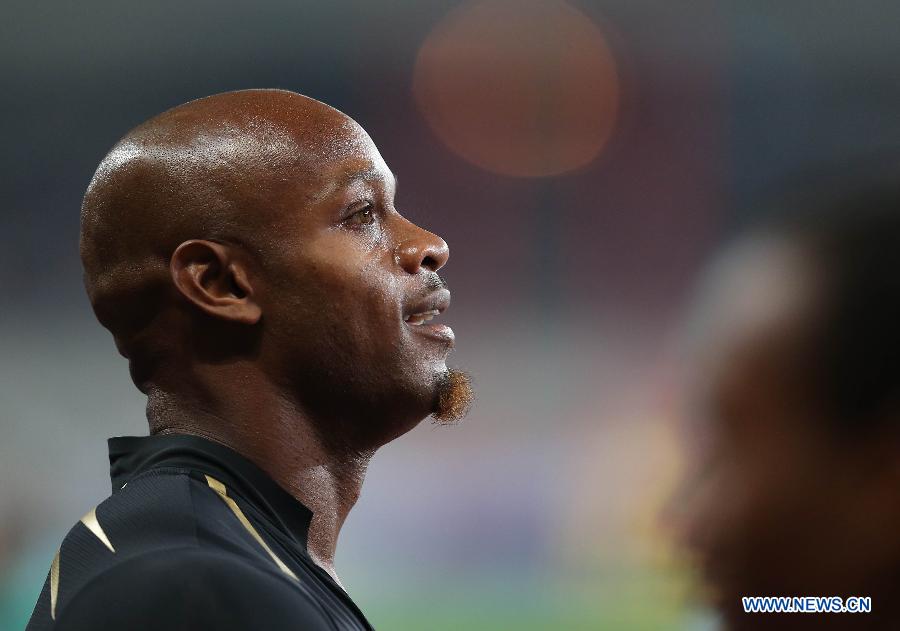 Former world record holder Asafa Powell of Jamaica reacts after winning the men's 100-meter race in 10.02 seconds at the 2012 Diamond League Shanghai, May 19, 2012. Track and field was dealt with a huge blow Sunday when the world's top sprinters failed drug tests. They are former world record holder Jamaican Asafa Powell, American champion Tyson Gay and Olympic medalist Sherone Simpson. (Xinhua File Photos)