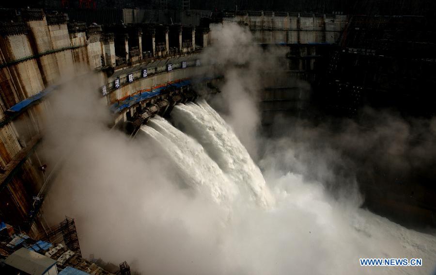 Photo taken on July 14, 2013 shows the first generator unit in Xiluodu hydropower station, which is located on the lower reach of Jinsha River between Leibo county of Sichuan Province and Yongshan county of Yunnan Province, both in southwest China. The first generator unit "13F" went into formal operation on Monday after a three-day trial. The hydropower plant will be the second largest one ranking only second to the Three Gorges when all of its 18 units go into operation in 2014. (Xinhua/Sun Ronggang)