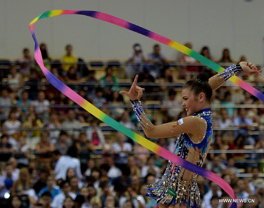 Alexandra Merkulova of Russia competes during Women's Individual Ribbon final of Gymnastics Rhythmic at the 27th Summer Universiade in Kazan, Russia, July 16, 2013. Merkulova won the silver with 17.966. (Xinhua/Kong Hui)