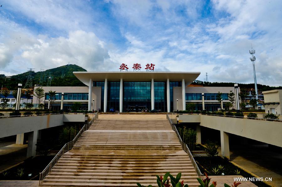 Photo taken on July 17, 2013 shows the finished Yongtai train station on Xiangtang-Putian Railway, or Xiangpu Railway, southeast China's Fujian Province. The 632-kilometer-long railway, which links Xiangtang Township in Nanchang, capital of east China's Jiangxi Province, and Putian City in Fujian, is expected to open to traffic by the end of this September after all debugging and commissioning finishes. The Xiangpu Railway, which will be one of the key transportation arteries for both travellers and goods in this area after it is opened to traffic, will also be the first railway running through seven districts and counties in Jiangxi and Fujian. (Xinhua/Chen Chunyuan)