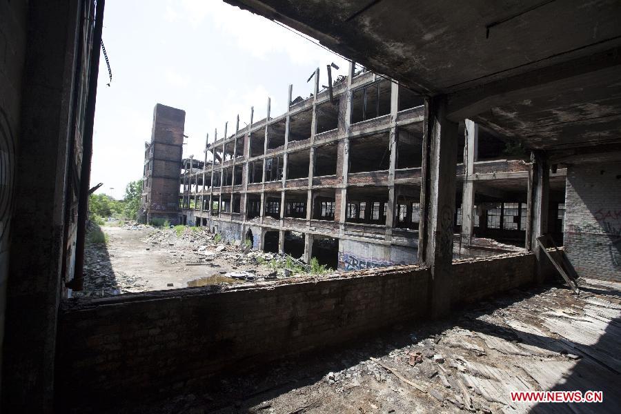 Photo taken on July 19, 2013 shows the Packard Plant, an abandoned auto factory, in Detroit, midwest city of the United States. U.S. city Detroit filed for bankruptcy Thursday, making it the largest-ever municipal bankruptcy in U.S. history, local media reported. (Xinhua/Marcus DiPaola)