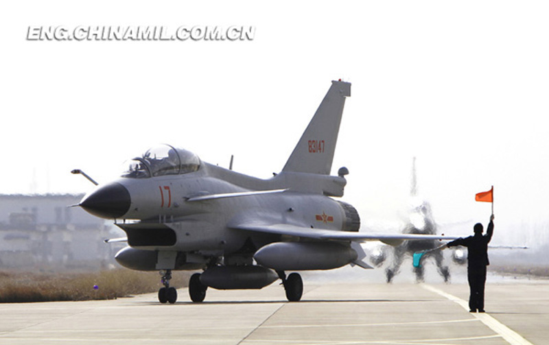 Several third-generation fighters of an aviation regiment under the East China Sea Fleet of the Navy of the Chinese People’s Liberation Army (PLAN) conducted actual-combat training on such subjects as ultra-low-altitude penetration, live-ammunition firing and so on in early July. (Chinamil.com.cn/Wang Zhaowu and Zhao Haitao)