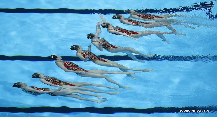 Team Russia competes in the Team Technical Finals of the Synchronised Swimming competition in the 15th FINA World Championships at Palau Sant Jordi in Barcelona, Spain, on July 22, 2013. Team Russia claimed the title with a total score of 96.600 points. (Xinhua/Wang Lili)