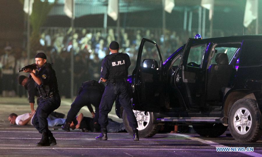 Algeria's special police force perform exercises during a ceremony to commemorate Algeria's 51st national police day in Algiers, Algeria, July 22, 2013. (Xinhua/Mohamed Kadri)