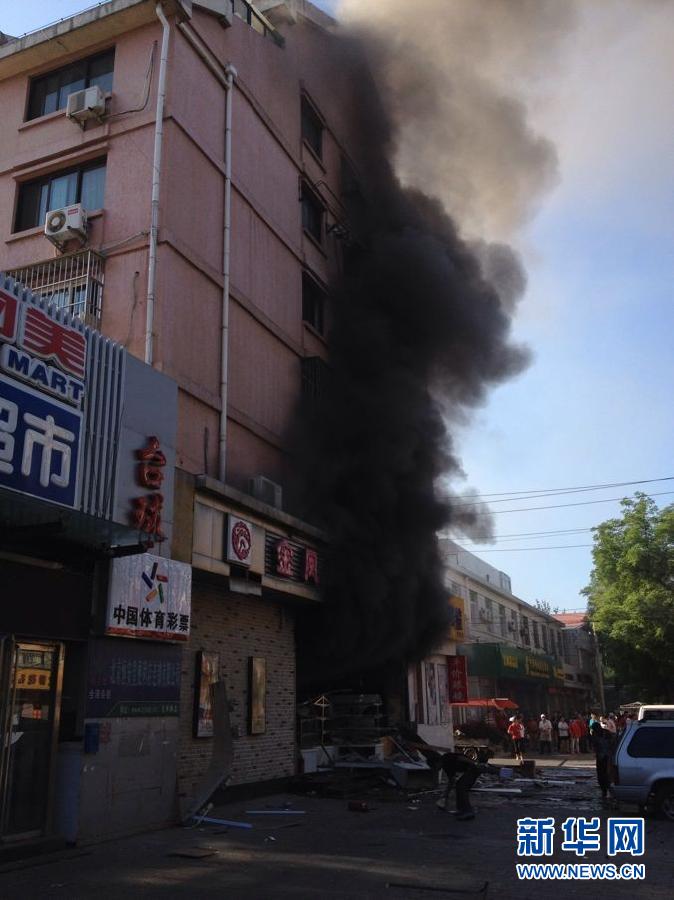 Eight people were injured in a gas explosion at a bakery Wednesday morning in downtown Beijing, local fire department confirmed. The explosion occurred at 7:33 a.m. in a Golden Phoenix Bakery store on Guangming Road, Dongcheng District. (Photo/Xinhua)