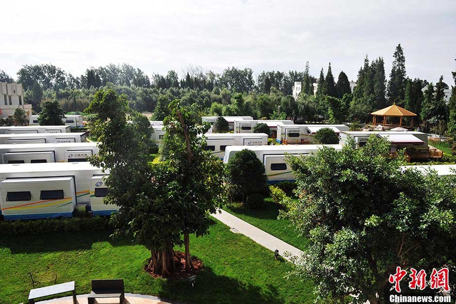 Photo taken on July 22 shows the scenic recreational vehicle camp at Kunming Dianchi National Tourist Resort in Kunming, capital city of southwest China's Yunnan province. (CNSPHOTO/Liu Ranyang)