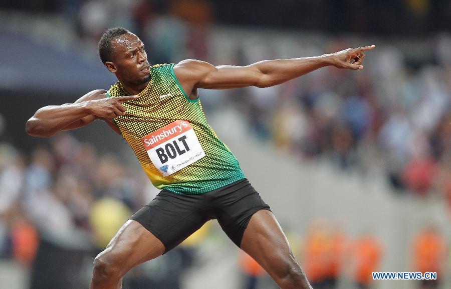 Usain Bolt of Jamaica reacts after winning the men's 100m race at the London Diamond League 'Anniversary Games' athletics meeting at the Olympic Stadium in London, Britain, on July 26, 2013. Bolt claimed the title with 9.85 seconds. (Xinhua/Yin Gang)