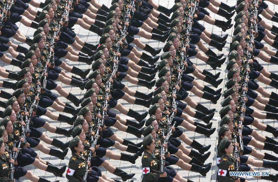 Soldiers march at a military parade in Pyongyang, the Democratic People's Republic of Korea (DPRK), July 27, 2013. DPRK held a military parade marking the 60th anniversary of the Korean War Armistice Agreement here on Saturday, the official KCNA news agency reported. (Xinhua/Zhang Li) 
