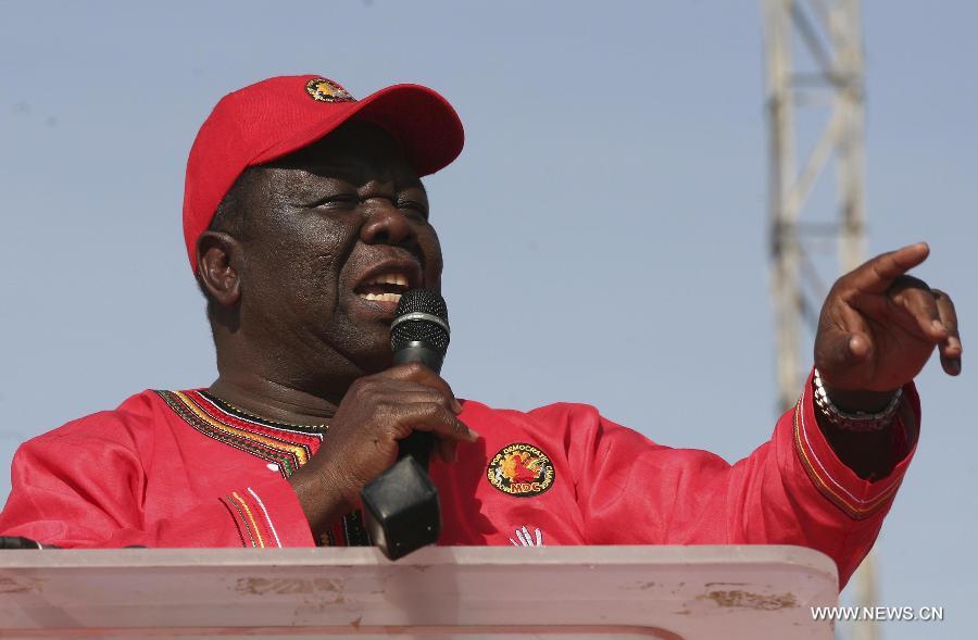 Presidential election candidate Morgan Tsvangirai addresses a campaign rally in Chitungwiza of Harare, capital of Zimbabwe, July 28, 2013. Zimbabweans are expected to vote on July 31 to choose a president, legislators, and local councilors. Incumbent President Robert Mugabe and Prime Minister Morgan Tsvangirai are considered the main contenders for the presidency. (Xinhua/Stringer) 