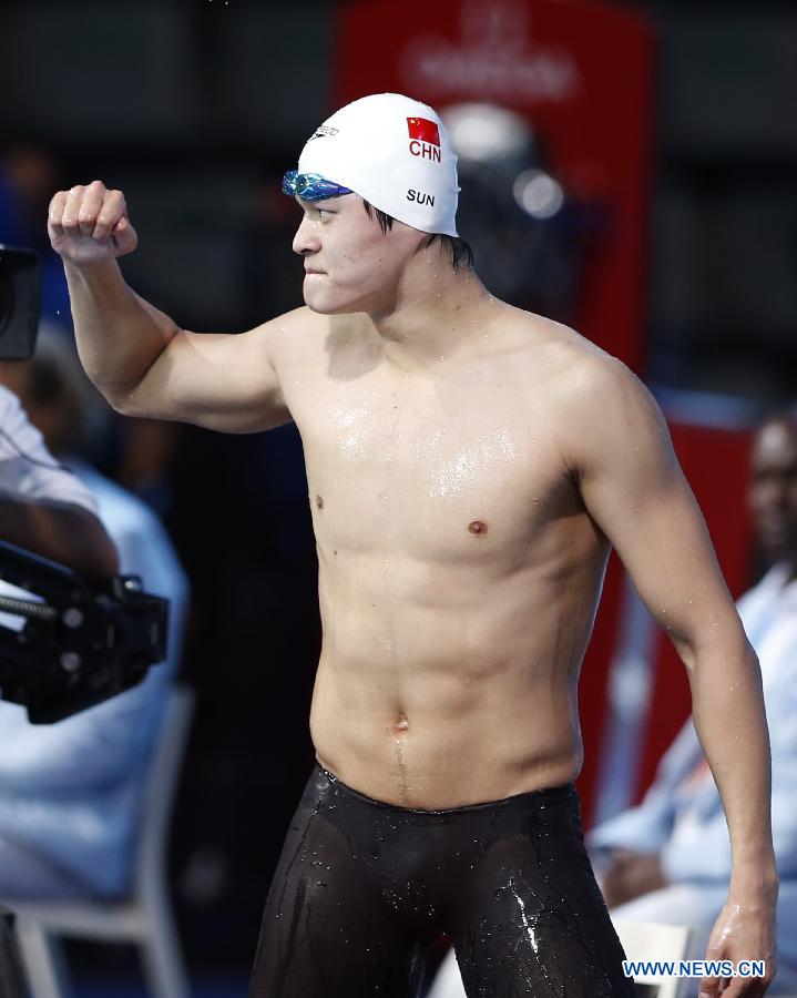 Sun Yang of China celebrates after the Men's 400m Freestyle Final of the Swimming competition on day 9 of the 15th FINA World Championships at Palau Sant Jordi in Barcelona, Spain on July 28, 2013. Sun Yang claimed the title with 3 minutes 41.59 seconds.(Xinhua/Guo Yong) 