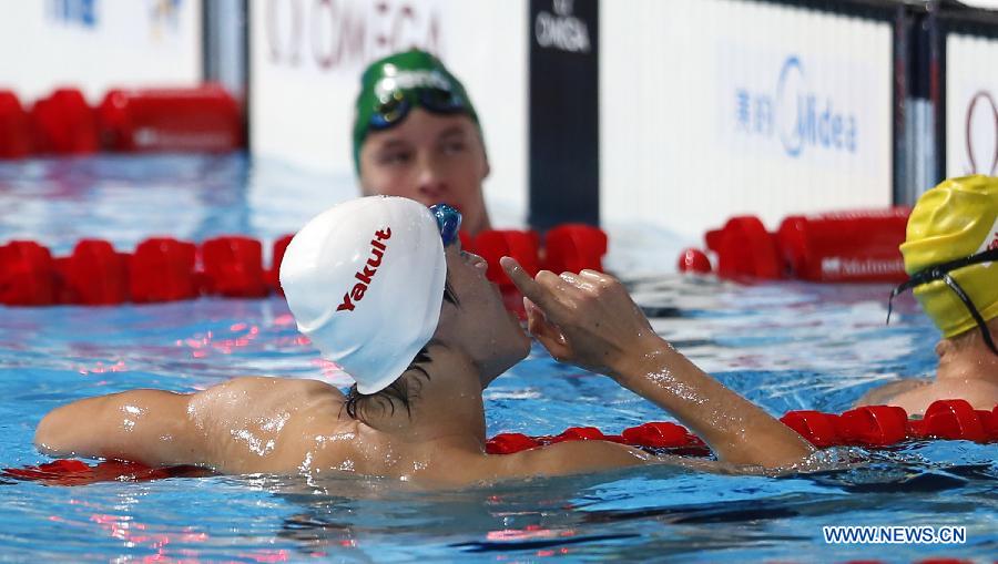 Sun Yang of China celebrates after the Men's 400m Freestyle Final of the Swimming competition on day 9 of the 15th FINA World Championships at Palau Sant Jordi in Barcelona, Spain on July 28, 2013. Sun Yang claimed the title with 3 minutes 41.59 seconds.(Xinhua/Guo Yong) 