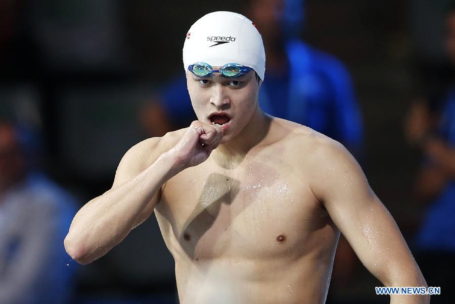 Sun Yang of China celebrates after the Men's 400m Freestyle Final of the Swimming competition on day 9 of the 15th FINA World Championships at Palau Sant Jordi in Barcelona, Spain on July 28, 2013. Sun Yang claimed the title with 3 minutes 41.59 seconds.(Xinhua/Guo Yong) 