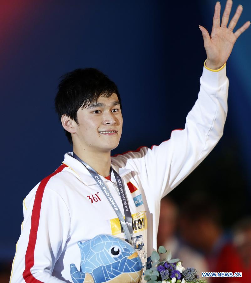 Sun Yang of China celebrates after the Men's 400m Freestyle Final of the Swimming competition on day 9 of the 15th FINA World Championships at Palau Sant Jordi in Barcelona, Spain on July 28, 2013. Sun Yang claimed the title with 3 minutes 41.59 seconds.(Xinhua/Guo Yong) 