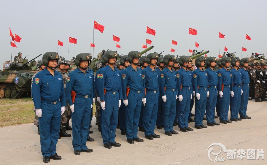 China on Saturday began to send military personnel and armaments to Russia, where they will join 20-day joint anti-terrorism drills held by both parties. (Photo source: xinhuanet.com)