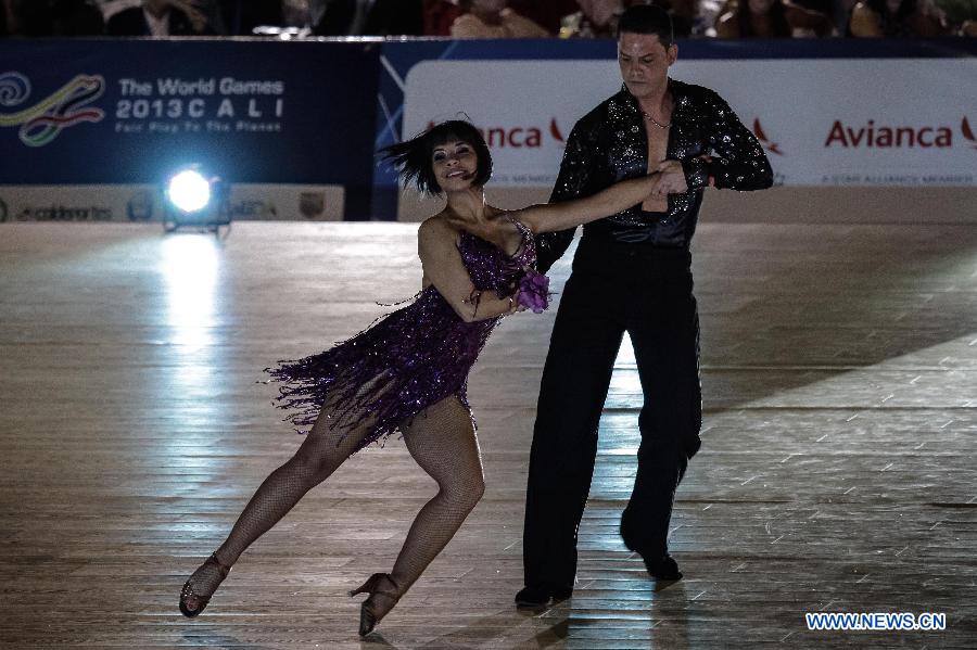 Chilean atlhetes Javier Ramirez (R) Valeria Navarrete compete in the Sports Dancing on Salsa category during the IX World Games 2013, in Caly City, Colombia, on July 28, 2013. (Xinhua/Jhon Paz)