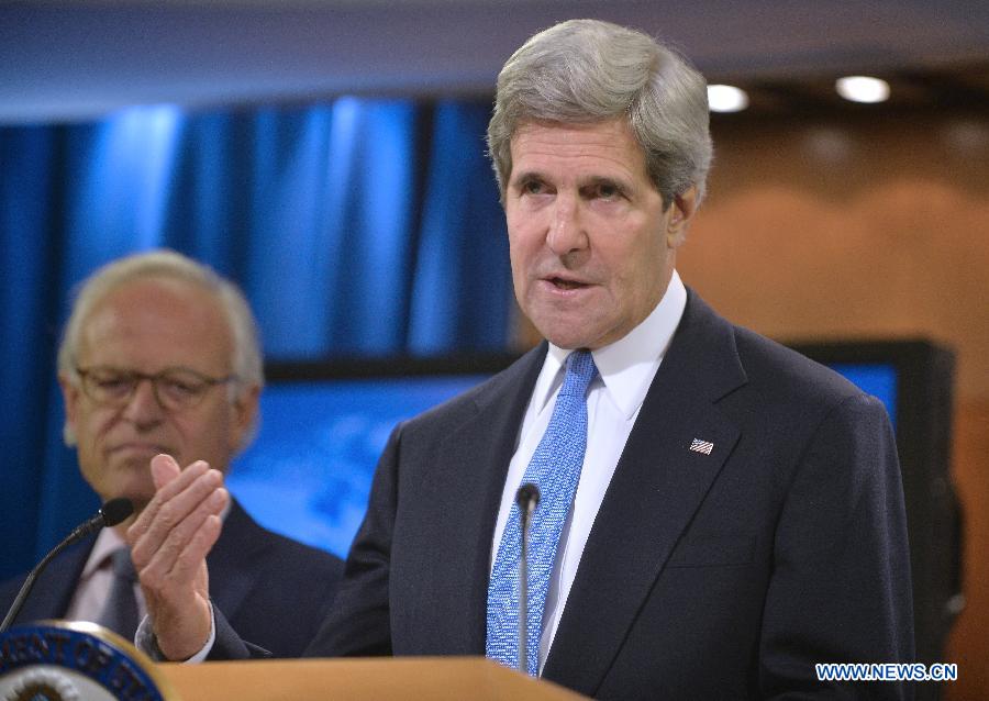 U.S. Secretary of State John Kerry (R) speaks as Martin Indyk, a former U.S. ambassador to Israel, listens during a press conference at the State Department in Washington D.C., capital of the United States, July 29, 2013. Kerry on Monday named Martin Indyk as his special envoy to guide the Israeli-Palestinian peace talks. The Israeli and Palestinian negotiators are set to begin their "initial talks" on Monday evening to lay the groundwork for final status negotiations, which will last at least nine months. (Xinhua/Zhang Jun) 