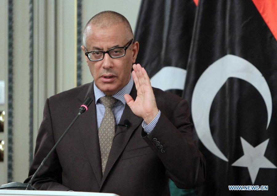 Libyan Prime Minister Ali Zeidan speaks during a press statement announcing a cabinet reshuffle in the coming days and recent developments in the security situation in Libya, July 29, 2013. (Xinhua/Hamza Turkia)