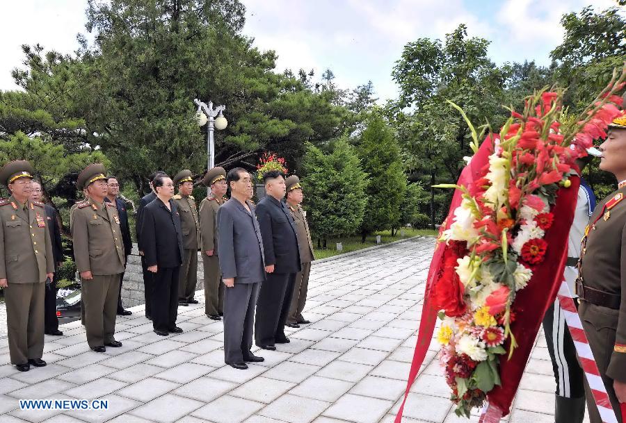 Photo taken on July 29, 2013 shows Kim Jong Un, top leader of the Democratic People's Republic of Korea (DPRK), visiting a cemetery in Hoechang County, South Phyongan Province, DPRK. Kim Jong Un, top leader of the Democratic People's Republic of Korea (DPRK), visited a cemetery on Monday to mourn fallen Chinese fighters in the Korean War, the official news agency KCNA reported on Tuesday. (Xinhua/KCNA) 
