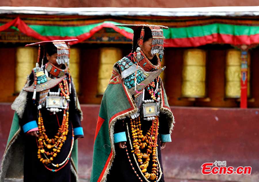 Tibetan women in traditional 'peacock costume' in a village of Burang County, Ngari Prefecture.(CNS/Li Lin)