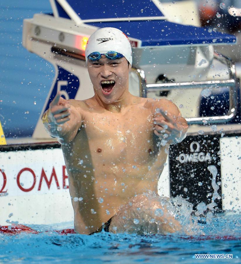 Sun Yang of China reacts after winning the men's 800m freestyle final of the swimming competition at the 15th FINA World Championships in Barcelona, Spain on July 31, 2013. Sun Yang won the gold medal with 7 minutes and 41.36 seconds. (Xinhua/Guo Yong)