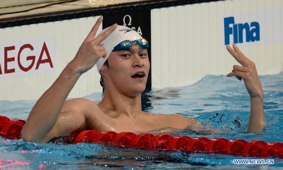 Sun Yang of China reacts after winning the men's 800m freestyle final of the swimming competition at the 15th FINA World Championships in Barcelona, Spain on July 31, 2013. Sun Yang won the gold medal with 7 minutes and 41.36 seconds. (Xinhua/Guo Yong)