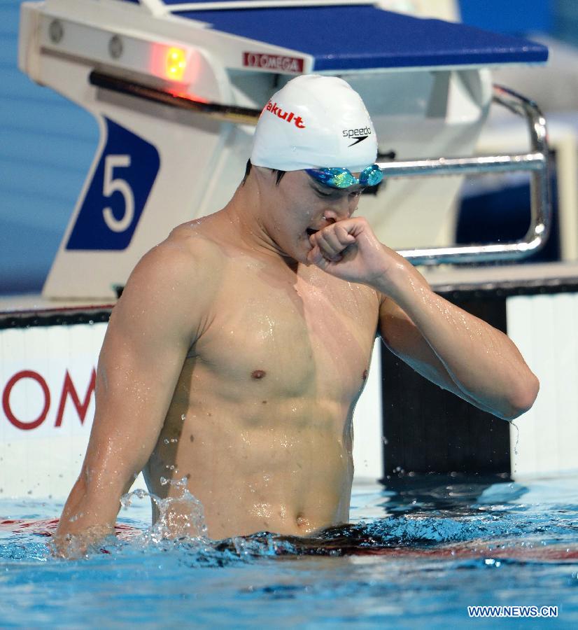 Sun Yang of China reacts after winning the men's 800m freestyle final of the swimming competition at the 15th FINA World Championships in Barcelona, Spain on July 31, 2013. Sun Yang won the gold medal with 7 minutes and 41.36 seconds. (Xinhua/Guo Yong)