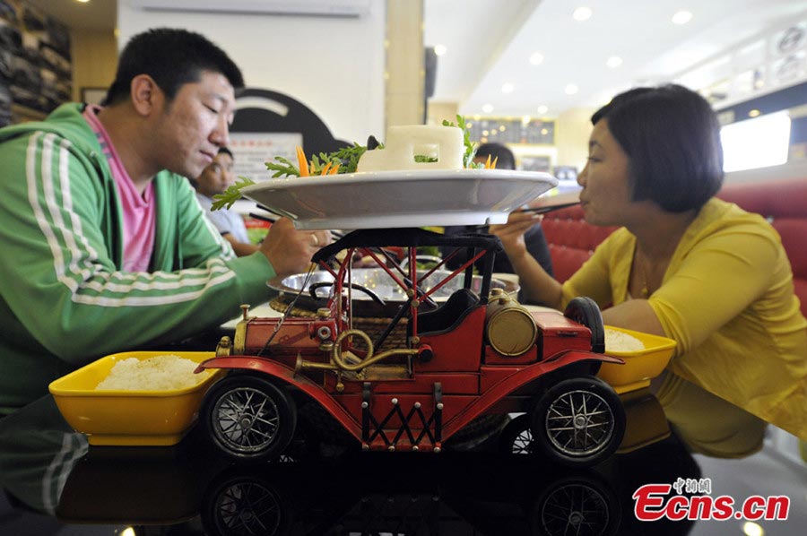 Photo taken on September 9, 2013 shows a car-themed restaurant in Taiyuan, capital city of north China's Shanxi province. (Photo/Wei Liang)