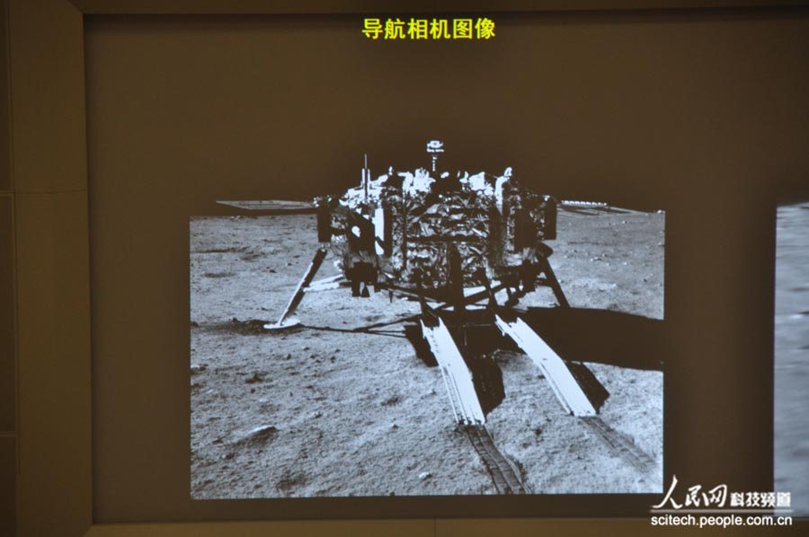 Photos: China's moon rover, lander photograph each other