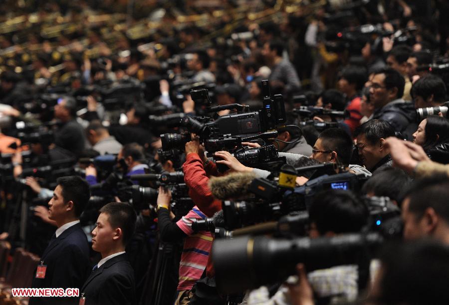 Journalists work at annual session of top political advisory body