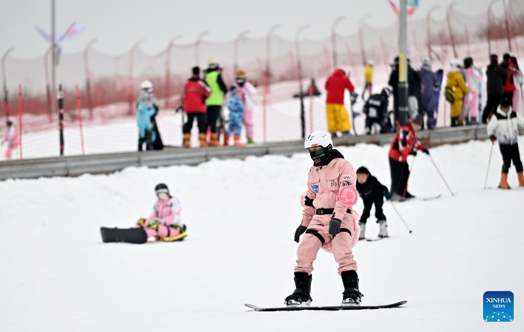 Tourists ski at Yuehai Ski Resort in Yinchuan, China's Ningxia