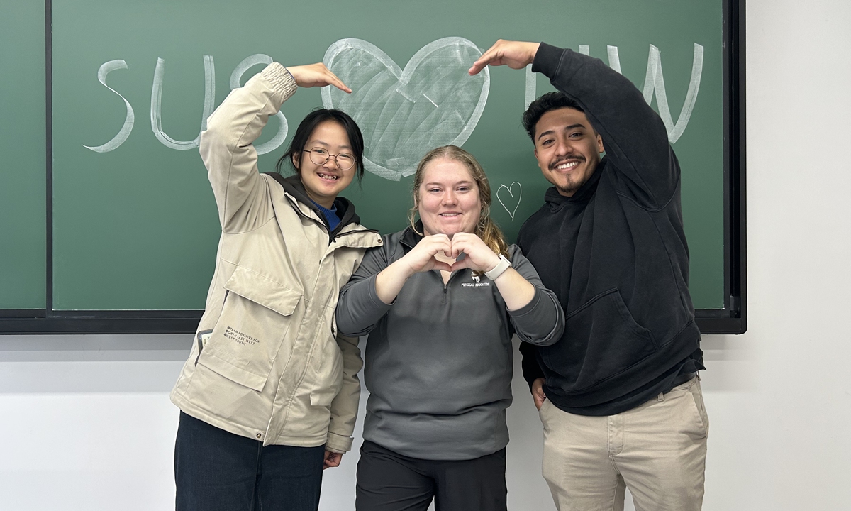 Xu Lulu (first left), Laci Sligar (middle) and Michael Torres pose for a photo on March 10, 2025. Photo: Huang Lanlan/GT