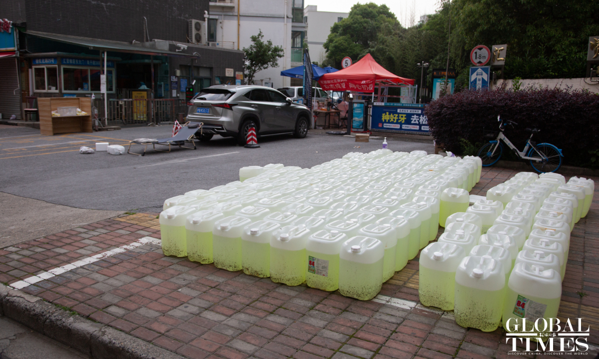 Disinfection supplies piled up at the entrance of a local community. Photo: Shi Liu/GT