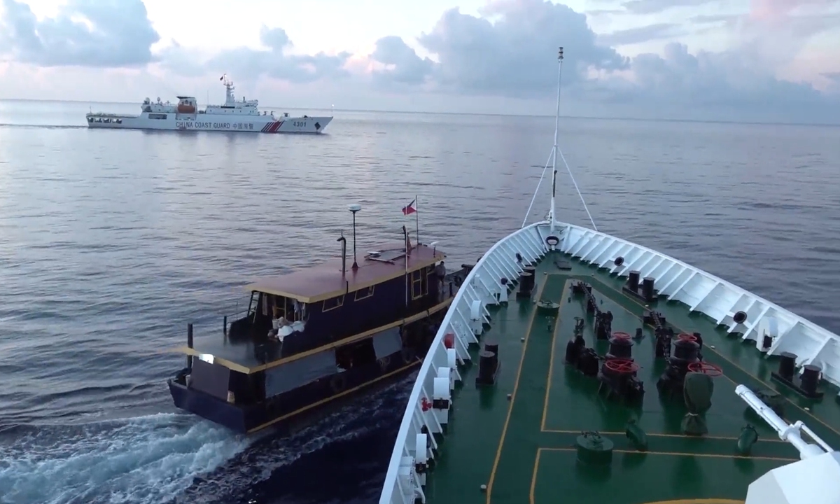 A Philippine vessel approaches a China Coast Guard vessel in a dangerous manner and leads to a bump in waters off China's Ren'ai Reef in the Nansha Islands in the South China Sea on October 22, 2023. Photo: Screenshot from a video released by China Coast Guard 